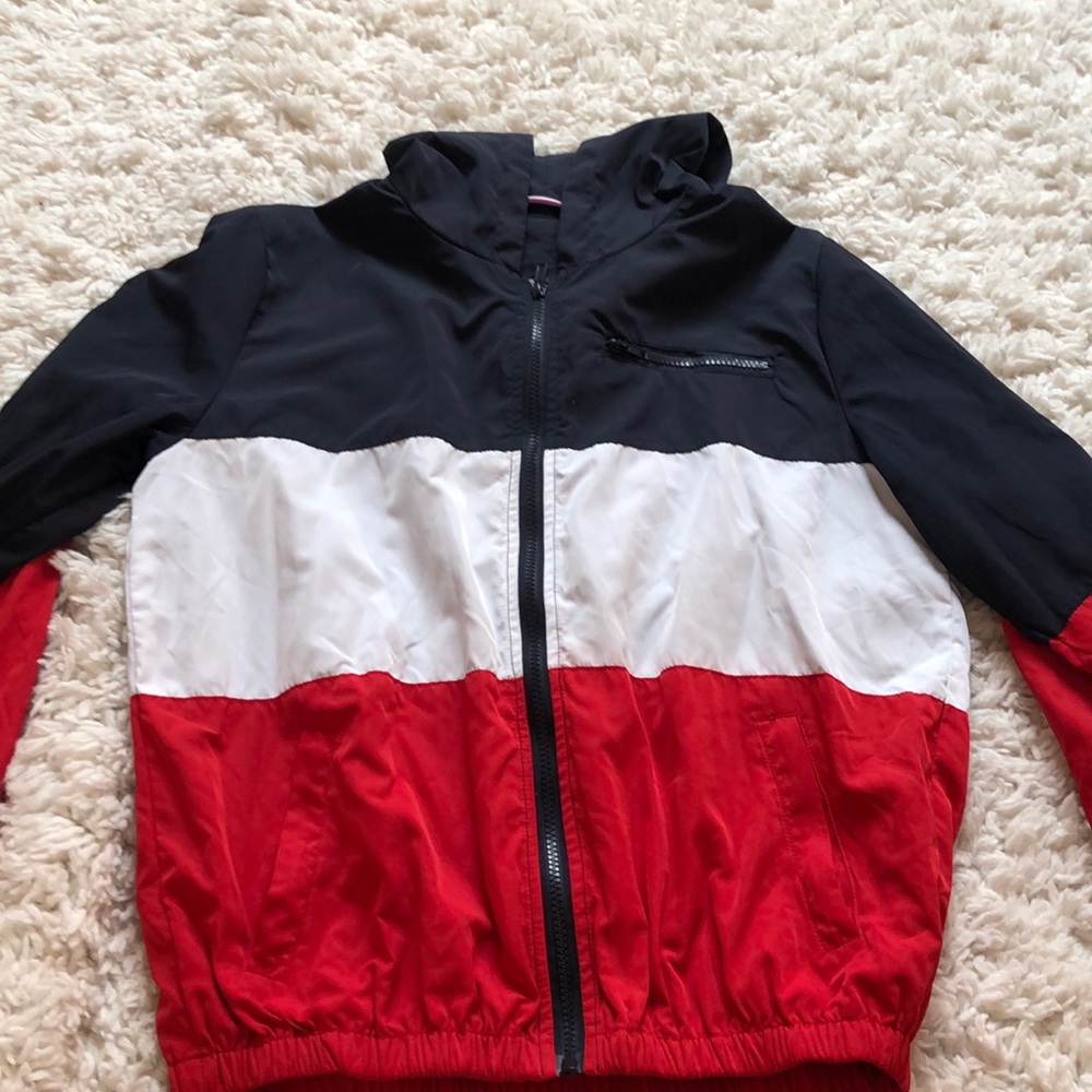 Blue white and red rain jacket